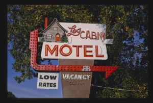 A log cabin can be an iconic motel sign or even conceptual art